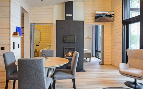 Jäkälänkallion Ranta: Roof, Home, Siding, Cottage, Yard, Hardwood, Design, Garden Buildings, Wood Stain, Farmhouse