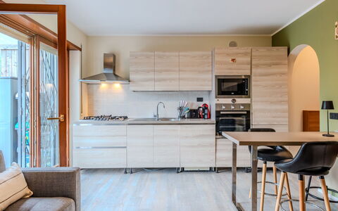 La Rosa: Furniture, Interior Design, Flooring, Kitchen, Countertop, Floor, Kitchen Appliance, Wood, Cabinetry, Chair