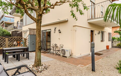 La Rosa: Residential Area, Home, Door, Balcony, Flowerpot, Houseplant, Yard, Shade, Courtyard, Porch