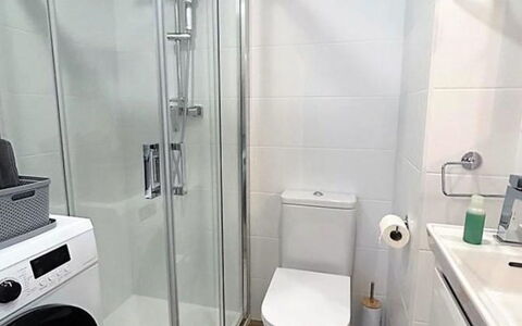 Caribe: Flooring, Floor, Interior Design, Plumbing Fixture, Toilet, Toilet Seat, Bathroom, Washing Machine, Plumbing, Room
