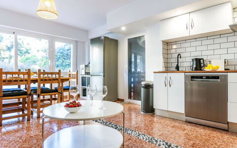 Popa: Flooring, Interior Design, Kitchen, Floor, Major Appliance, Wood, Furniture, Ceiling, Kitchen Appliance, Countertop