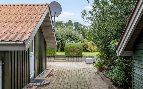 Dior - 800M from the Sea: Roof, Architecture, Home, Shrub, House, Residential Area, Siding, Cottage, Shade, Garden