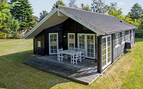 Heidrun - 400M from the Sea: Cottage, Shade, Hardwood, Porch, Garden Buildings, Plank, Siding, Resort, Outdoor Structure, Log Cabin