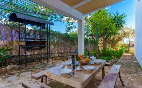 Sa Serra: Furniture, Chair, Outdoor Furniture, Resort, Shade, Eco Hotel, Garden, Backyard, Kitchen & Dining Room Table, Outdoor Table