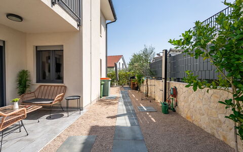 Le Vito: Residential Area, Home, Flagstone, Composite Material, Garden, Concrete, Driveway, Shade, Walkway, Landscaping