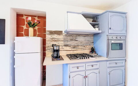 Il Giardino di Anzio: Kitchen, Kitchen Appliance, Major Appliance, Furniture, Cabinetry, Countertop, Interior Design, Kitchen Stove, Wood, Flooring