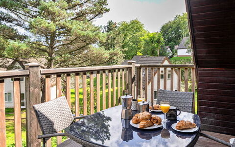 Daisy Valley Lodge: Furniture, Outdoor Furniture, Chair, Outdoor Table, Deck, Porch, Fence, Hardwood, Garden, Handrail