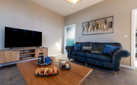 Towan Beach: Interior Design, Furniture, Flooring, Floor, Couch, Wood, Ceiling, Living Room, Room, Lighting