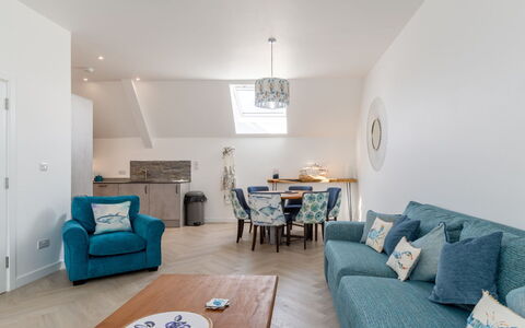 Towan Lobster: Furniture, Interior Design, Flooring, Couch, Floor, Room, Ceiling, Wood, Living Room, Table