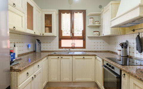 Red House: Kitchen, Cabinetry, Countertop, Kitchen Appliance, Major Appliance, Interior Design, Wood, Furniture, Flooring, Cupboard