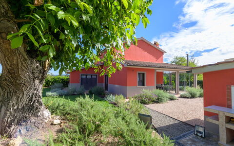 Red House: Sky, Roof, House, Shrub, Residential Area, Home, Land Lot, Cottage, Rural Area