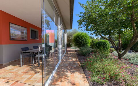 Red House: Shade, Garden, Outdoor Furniture, Glass, Landscaping, Patio, Yard, Outdoor Structure, Backyard, Walkway