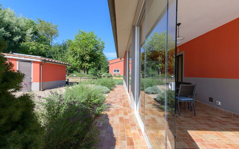 Red House: Shade, Garden, Backyard, Brick, Estate, Yard, Landscaping, Hacienda, Daylighting, Courtyard