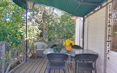 A Casetta: Furniture, Outdoor Furniture, Chair, Outdoor Table, Table, Shade, Porch, Kitchen & Dining Room Table, Glass, Metal