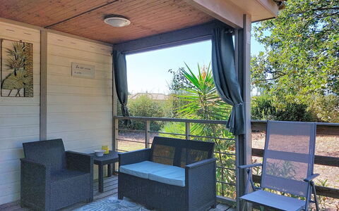A Casetta: Wood, Furniture, Porch, Chair, Outdoor Furniture, Deck, Shade, Outdoor Table, Hardwood, Wood Stain
