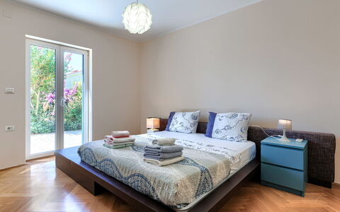 Istria Serenity: Bed, Furniture, Interior Design, Bedding, Bedroom, Bed Sheet, Floor, Flooring, Wall, Room