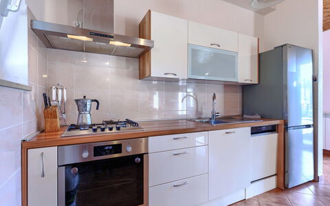 Istria Serenity: Kitchen Appliance, Kitchen, Countertop, Cabinetry, Major Appliance, Flooring, Kitchen Stove, Home Appliance, Wood, Stove