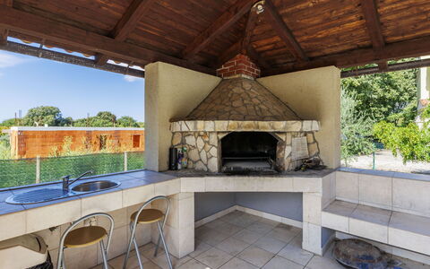 Istria Serenity: Shade, Wood Stain, Chair, Garden, Tile, Pavilion, Natural Material, Outdoor Structure, Backyard, Resort