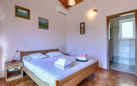 Istria Serenity: Bed, Bedroom, Floor, Wood, Flooring, Bed Sheet, Interior Design, Bedding, Furniture, Ceiling