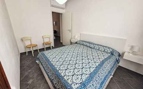 Due Passi: Bedroom, Floor, Bed, Flooring, Bed Sheet, Bedding, Interior Design, Bed Frame, Room, Apartment