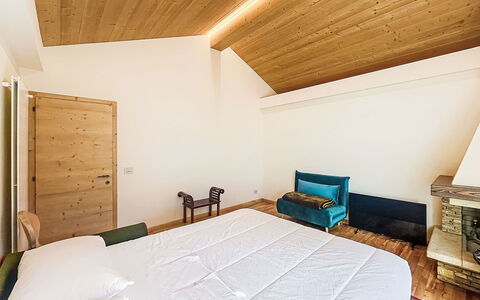 Dorian: Interior Design, Flooring, Wood, Floor, Ceiling, Furniture, Bedroom, Lighting, Room, Bed