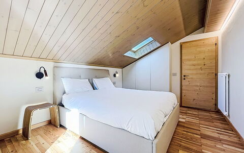Dorian: Interior Design, Flooring, Wood, Floor, Ceiling, Furniture, Room, Bedroom, Lighting, Bed