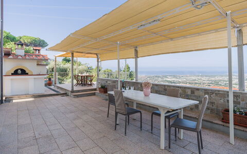 L'Edera e Il Mare: Floor, Flooring, Chair, Shade, Outdoor Furniture, Balcony, Outdoor Structure, Houseplant, Tile, Kitchen & Dining Room Table