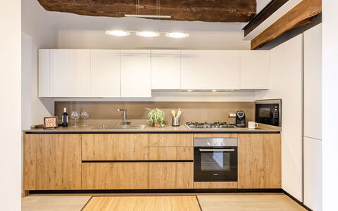 La Casa in Centro: Interior Design, Furniture, Kitchen, Countertop, Flooring, Wood, Cabinetry, Floor, Kitchen Appliance, Room