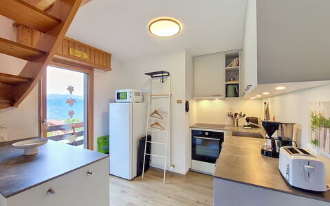 Domino C D-1: Interior Design, Flooring, Furniture, Kitchen, Wood, Floor, Major Appliance, Countertop, Ceiling, Room