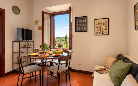La Veduta - la Finestra su Castelfalfi: Wall, Furniture, Flooring, Interior Design, Floor, Room, Kitchen & Dining Room Table, Chair, Dining Room, Ceiling