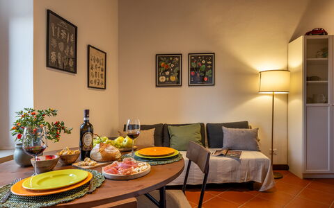 La Veduta - la Finestra su Castelfalfi: Furniture, Interior Design, Wall, Flooring, Wood, Floor, Room, Ceiling, Lighting, Orange