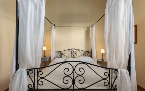 La Certaldina Luna Apartment: Furniture, Bed, Interior Design, Bedroom, Linens, Canopy Bed, Bedding, Textile, Floor, Bed Frame