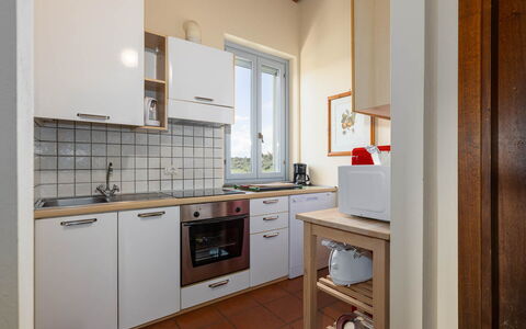 La Certaldina Luna Apartment: Kitchen Appliance, Kitchen, Major Appliance, Countertop, Interior Design, Flooring, Cabinetry, Kitchen Sink, Room, Furniture