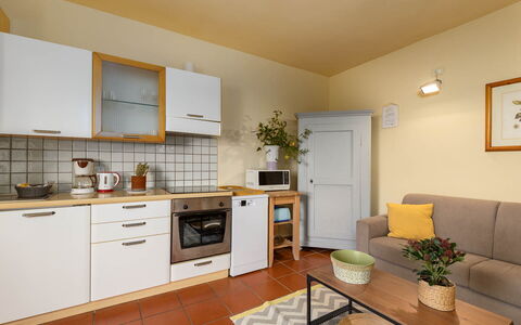La Certaldina Stella Apartment: Furniture, Kitchen Appliance, Major Appliance, Interior Design, Kitchen, Flooring, Wood, Countertop, Cabinetry, Floor