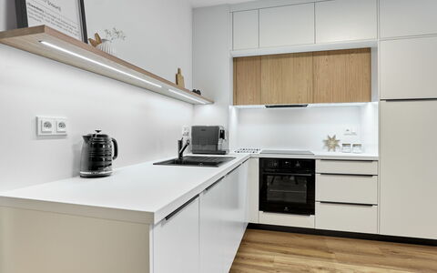 Lagom: Kitchen, Countertop, Kitchen Appliance, Cabinetry, Interior Design, Flooring, Furniture, Wood, Major Appliance, Floor