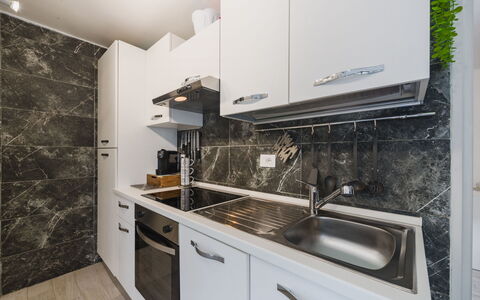 Dimora Little Dream: Flooring, Countertop, Kitchen, Interior Design, Floor, Major Appliance, Cabinetry, Room, Furniture, Kitchen Appliance