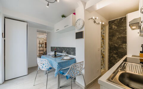 Dimora Little Dream: Interior Design, Flooring, Floor, Furniture, Wood, Room, Ceiling, Kitchen, Major Appliance, Countertop