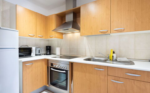 Balandros Sun: Kitchen, Countertop, Major Appliance, Cabinetry, Kitchen Appliance, Wood, Interior Design, Flooring, Furniture, Floor