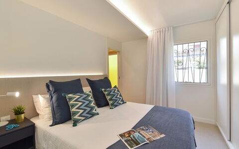 Red Rocks: Interior Design, Flooring, Floor, Bed, Bedroom, Furniture, Ceiling, Room, Textile, Bed Sheet