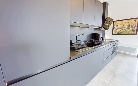 Les Alizés: Kitchen, Kitchen Appliance, Countertop, Major Appliance, Flooring, Interior Design, Cabinetry, Kitchen Stove, Home Appliance, Wood