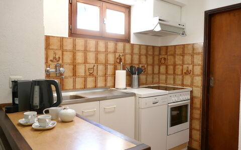 Ca' Angiulin: Kitchen, Kitchen Appliance, Countertop, Major Appliance, Flooring, Wood, Interior Design, Cabinetry, Floor, Kitchen Stove