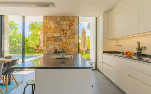 Azure: Interior Design, Flooring, Kitchen, Countertop, Wall, Floor, Wood, Ceiling, Furniture, Home