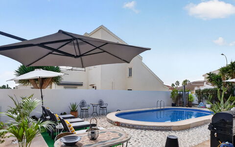 Quesada: Outdoor Furniture, Swimming Pool, Umbrella, Resort, Chair, Eco Hotel, Shade, Flowerpot, Sunlounger, Patio