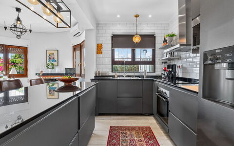 Quesada: Kitchen, Kitchen Appliance, Countertop, Cabinetry, Furniture, Interior Design, Major Appliance, Kitchen Stove, Home Appliance, Flooring