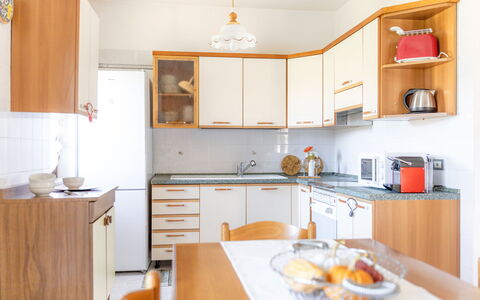 Casa Margia: Kitchen, Furniture, Kitchen Appliance, Countertop, Interior Design, Wood, Cabinetry, Major Appliance, Flooring, Room