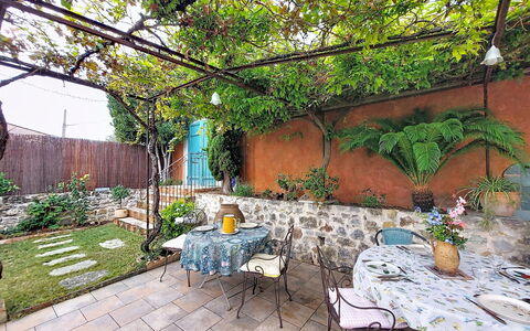 Maison de Village Manolsi: Furniture, Flowerpot, Flagstone, Garden, Chair, Outdoor Furniture, Shade, Backyard, Houseplant