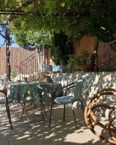 Maison de Village Manolsi: Furniture, Outdoor Furniture, Chair, Table, Outdoor Table, Shade, Garden, Coffee Table, Kitchen & Dining Room Table, Flowerpot