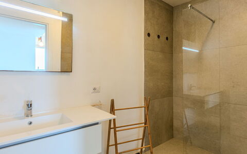 Casa Panoramica: Flooring, Wall, Floor, Interior Design, Plumbing Fixture, Bathroom, Ceiling, Lighting, Light Fixture, Mirror
