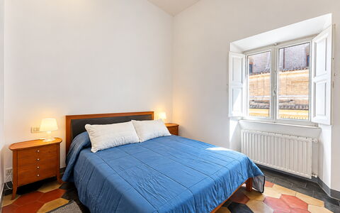 Appartamento Chiavari, Roma: Flooring, Floor, Wood, Interior Design, Bedroom, Bed, Ceiling, Room, Bed Sheet, Bed Frame