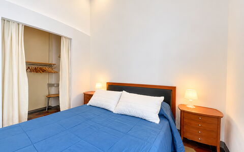 Appartamento Chiavari, Roma: Floor, Flooring, Interior Design, Bed, Bedroom, Wood, Furniture, Bed Sheet, Room, Ceiling